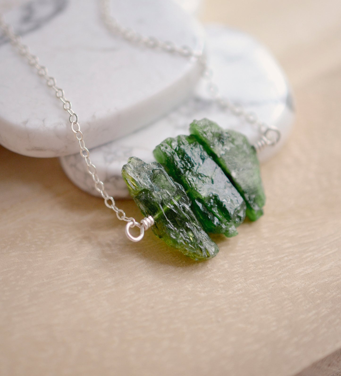 Natural green Chrome Diopside raw crystals set onto a sterling silver chain.