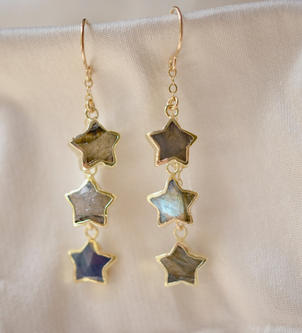 Three labradorite star shaped gemstones hang from each earring. Shown in gold filled.