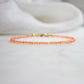 Genuine orange Sunstone beaded bracelet. The stones are round and faceted.