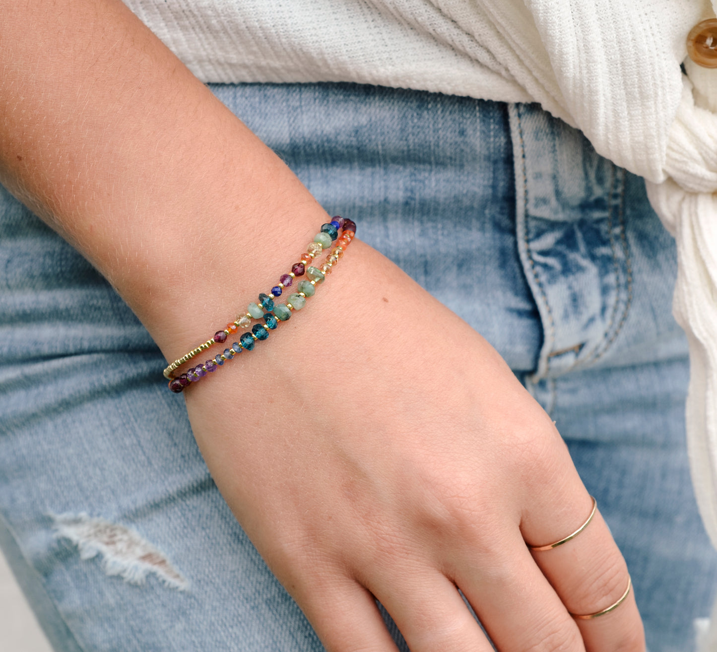 Real Gemstone Chakra or Rainbow Pride Bracelet. Handmade with garnet, carnelian, CZ, emerald, topaz, lapis lazuli, and amethyst in gold or silver.
