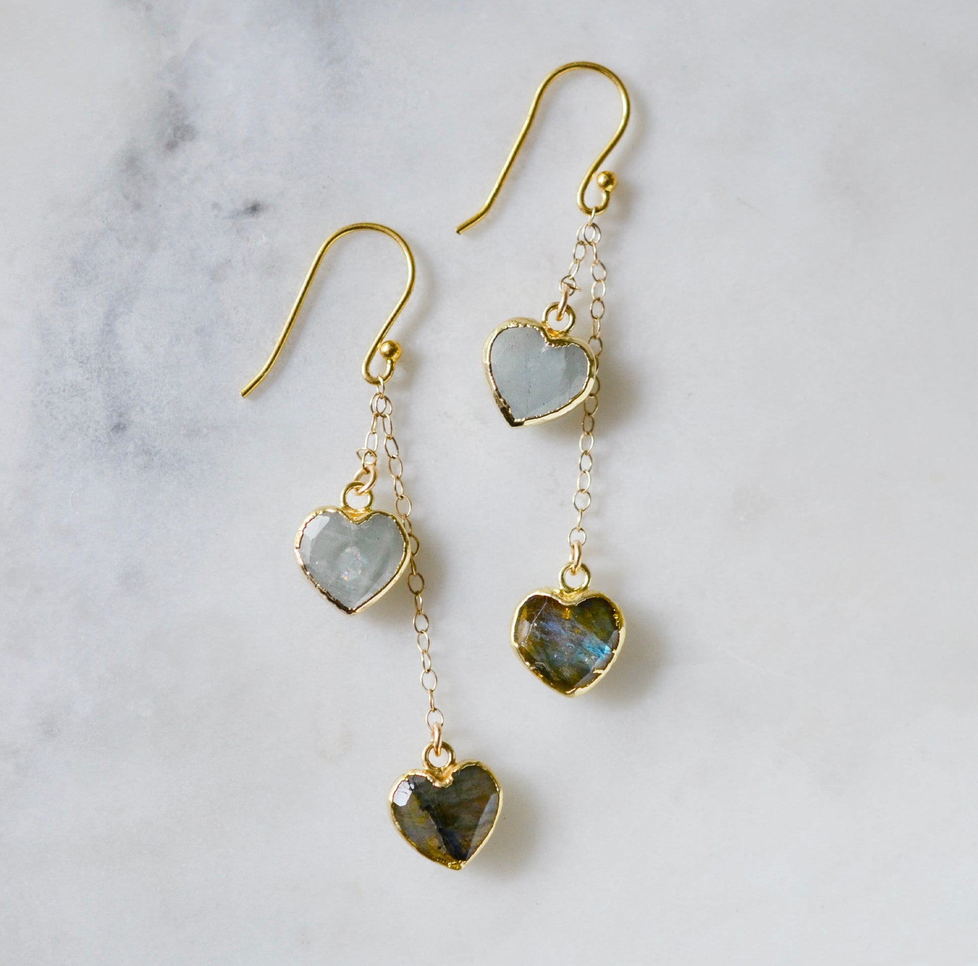 Gold gemstone dangle earrings featuring aquamarine and labradorite hearts. Romantic gift for her, wife, girlfriend, valentines day.
