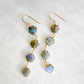 Long labradorite earrings designed for those who love a statement. These earrings feature four hexagonal gemstones with blue and green flash dangling in a straight line. Available in sterling silver or 14k gold filled.
