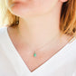 A modeled image of the turquoise teardrop necklace in sterling silver.
