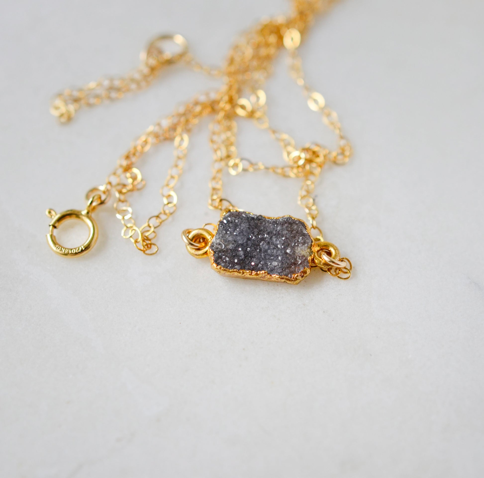 14k gold filled gemstone necklace with a gray druzy pendant.