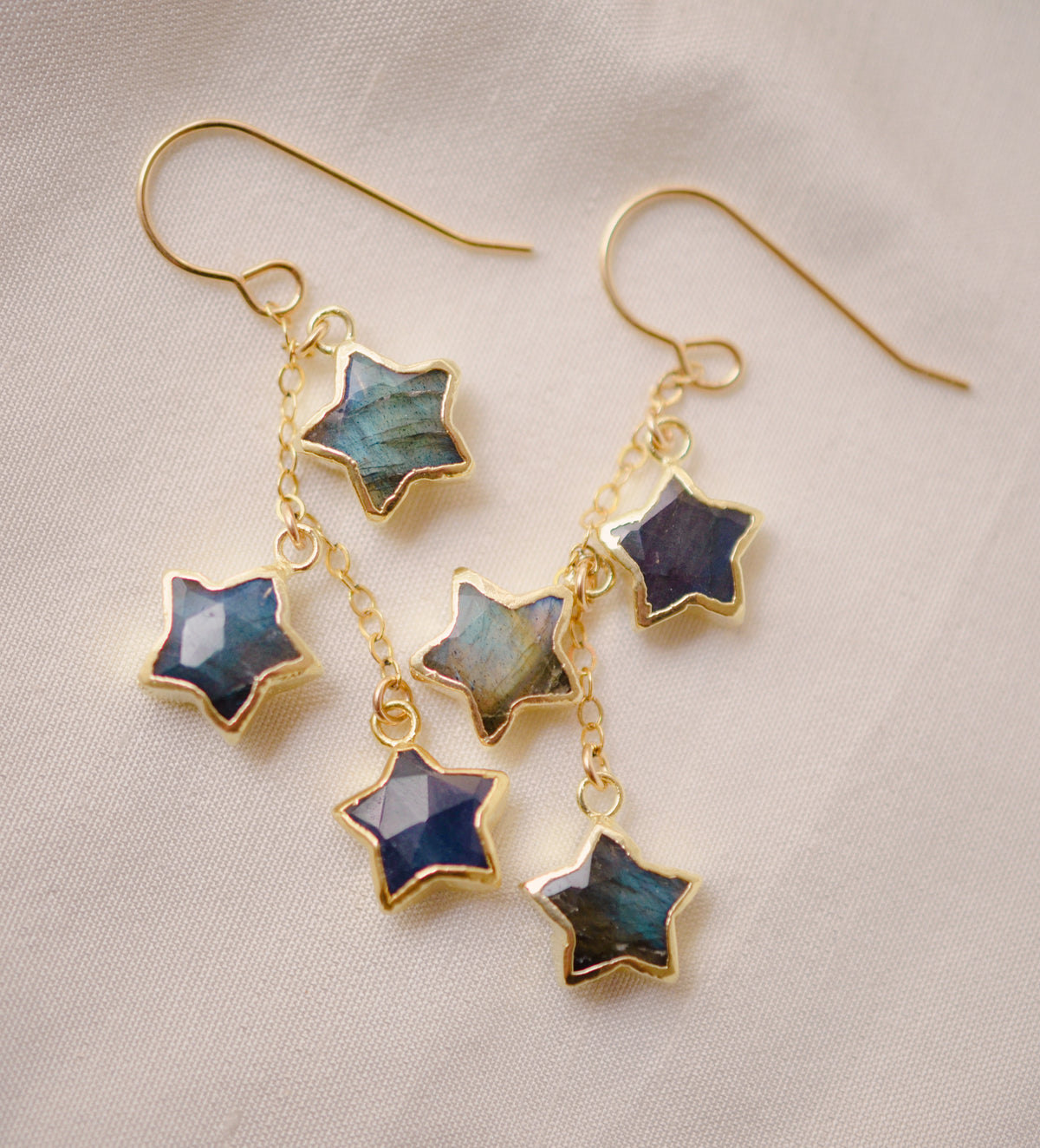 Three labradorite star shaped gemstones hang from each earring. Handmade in 14k gold filled or sterling silver.