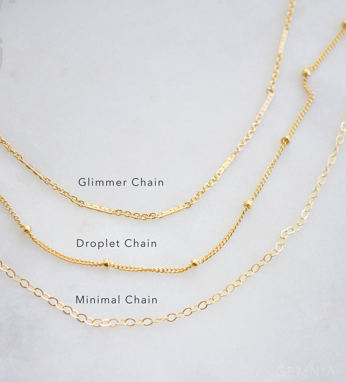 Chain Style Options. The glimmer chain has bar-like sequins. The Droplet Chain has little round beads every inch. The Minimal Chain is a shimmering cable chain.