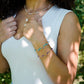 Handmade beaded gemstone crystal bracelet in gold filled or sterling silver. These bracelets feature a gemstone of your choice on a bracelet that can be stacked with others or worn alone. Modeled image.