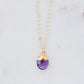 Necklace with a purple amethyst teardrop pendant and 14k gold filled dainty chain. Handmade gemstone jewelry in Connecticut by GEMNIA.