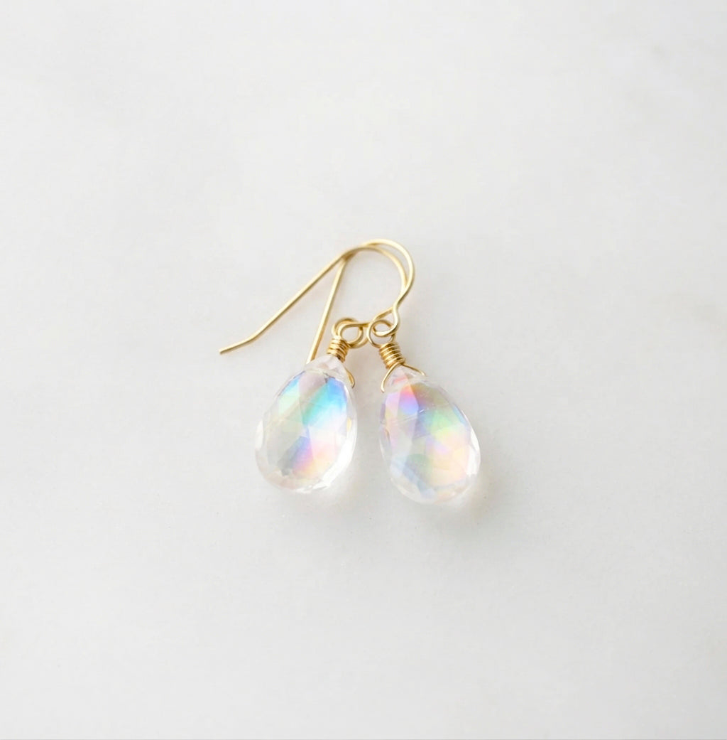 Genuine rainbow mystic topaz dangle earrings in 14k gold filled. The stones are clear, but flash rainbow colors when turned side to side. Also available in sterling silver. Handmade dainty gemstone jewelry by Gemnia.