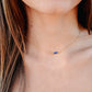 Three genuine Lapis Lazuli stones set onto a sterling silver chain. Modeled image. Connecticut Handmade Jewelry by GEMNIA. 