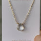 A clear, natural crystal quartz faceted teardrop set onto a 14k gold filled chain. Movie.