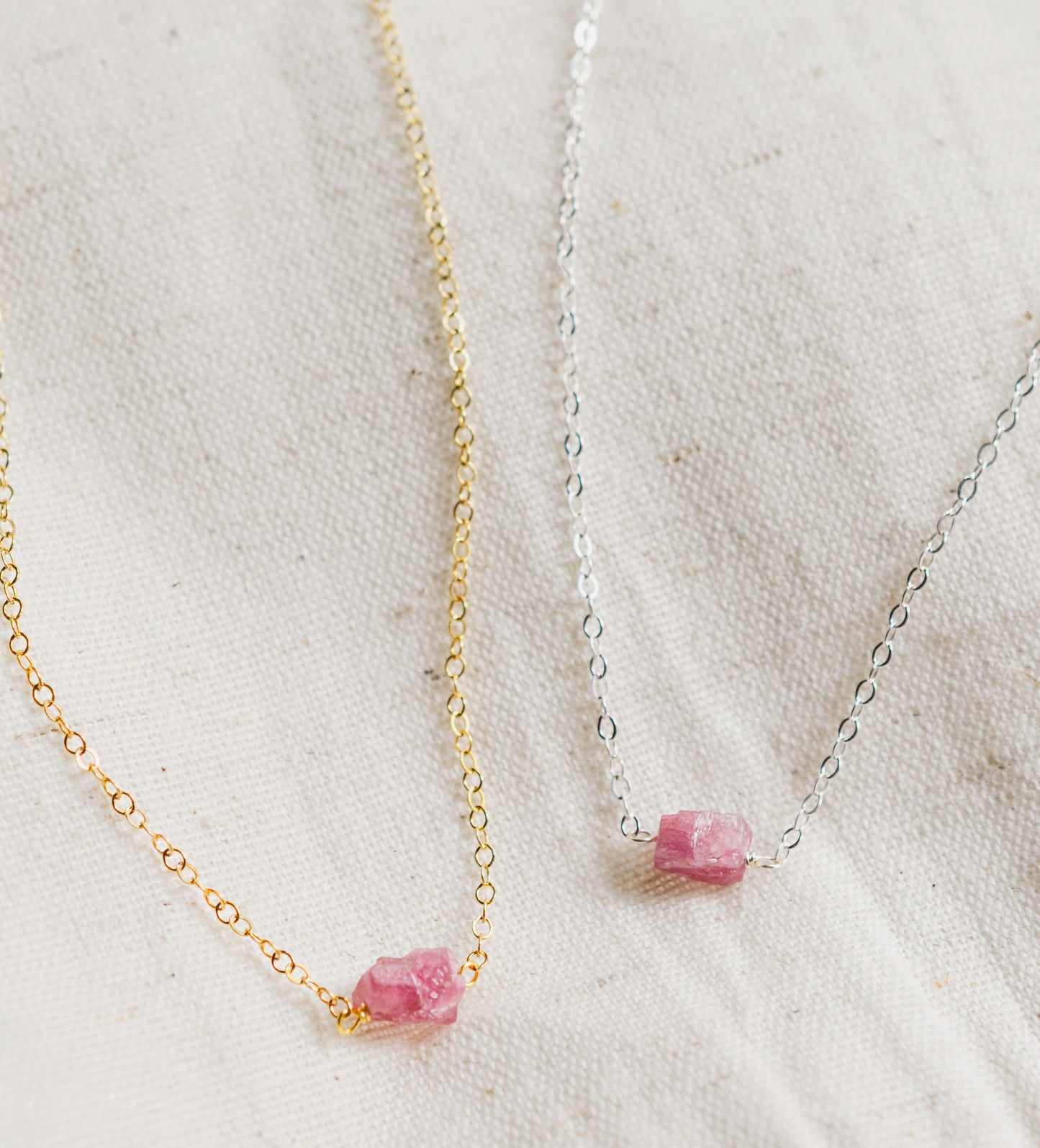 Small natural pink tourmaline crystal set onto a sterling silver or 14k gold filled chain. 