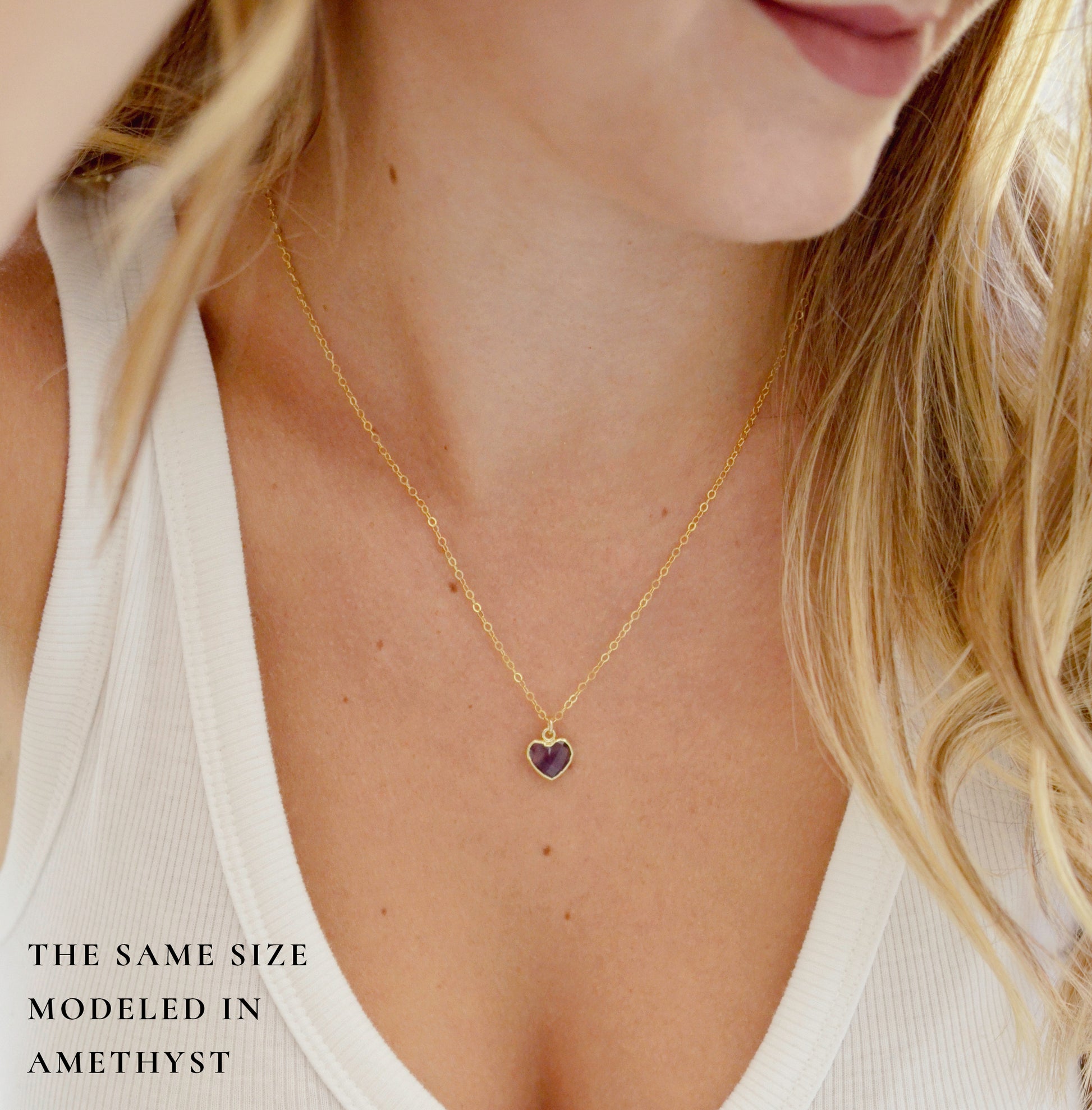 Modeled image of the same heart necklace in amethyst and gold.