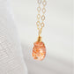 Orange Sunstone smooth polished teardrop pendant on a 14k gold filled chain. Stones shimmer in the light and when turned from side to side. 