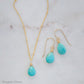 Turquoise pendant shown on a beaded chain with the matching earrings. Earrings are sold separately.