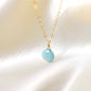 Natural aqua-blue Larimar faceted teardrop pendant set onto a 14k gold filled chain.