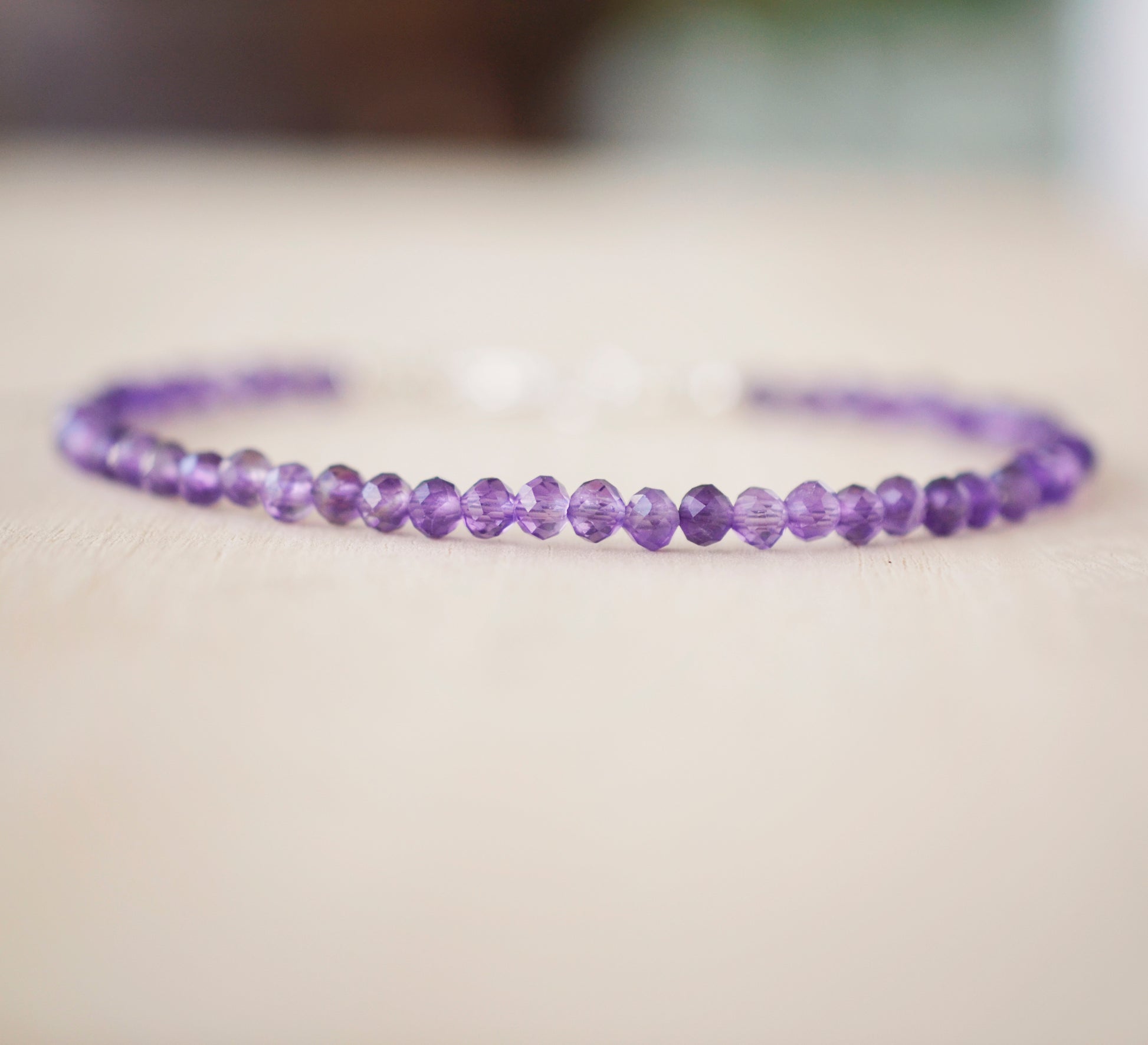 Purple Amethyst bracelet handmade with small faceted gemstones. Sterling Silver or 14k Gold Filled.