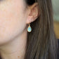 Natural Blue Aquamarine Earrings, 14k Gold Filled, Sterling Silver. Faceted teardrop dangles. Modeled image.
