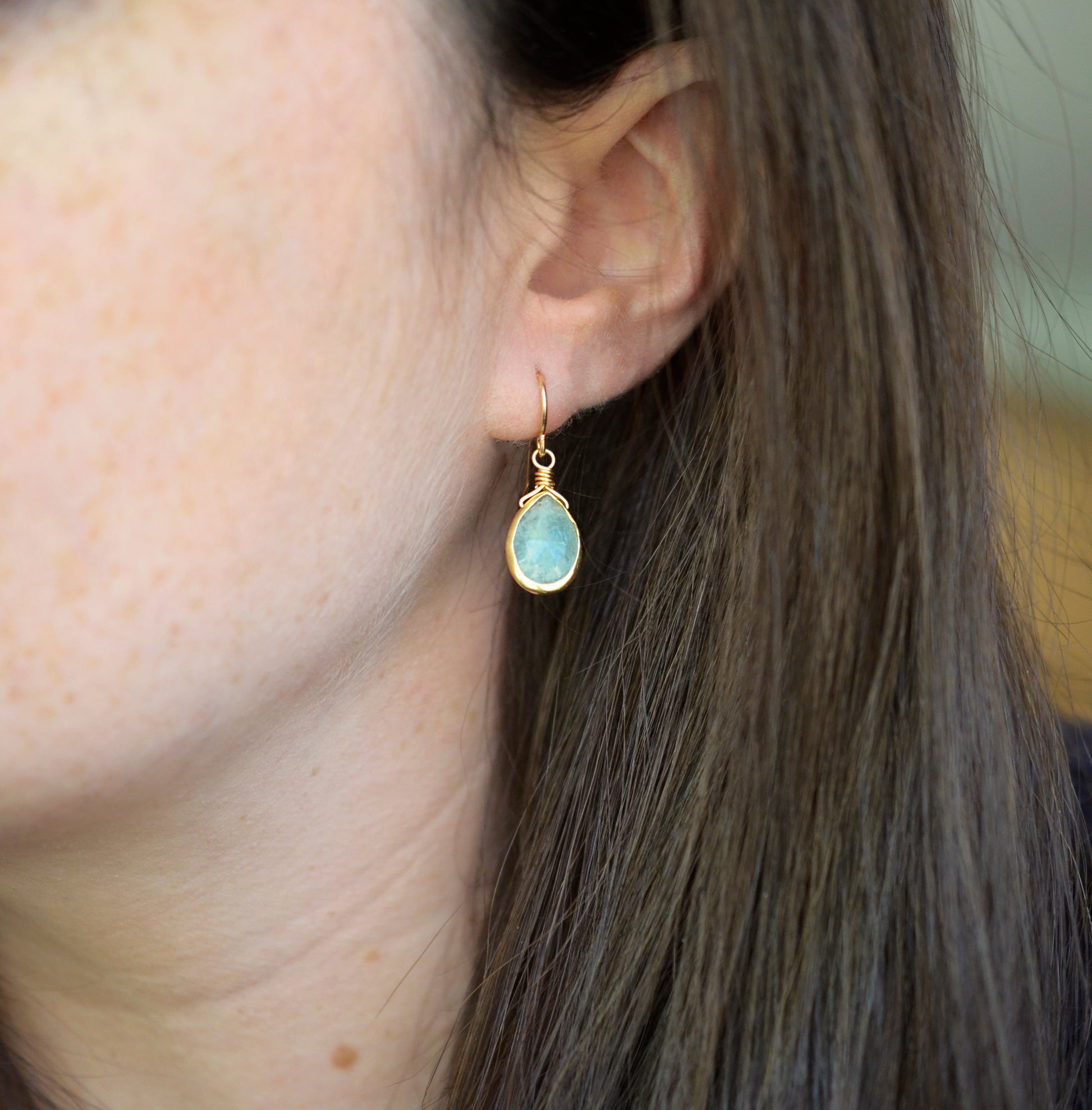 Natural Blue Aquamarine Earrings, 14k Gold Filled, Sterling Silver. Faceted teardrop dangles. Modeled image.