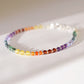 Handmade real gemstone bracelet for the Chakras or Pride. Stones include: Garnet, amethyst, topaz, emerald, carnelian, CZ, and tanzanite.