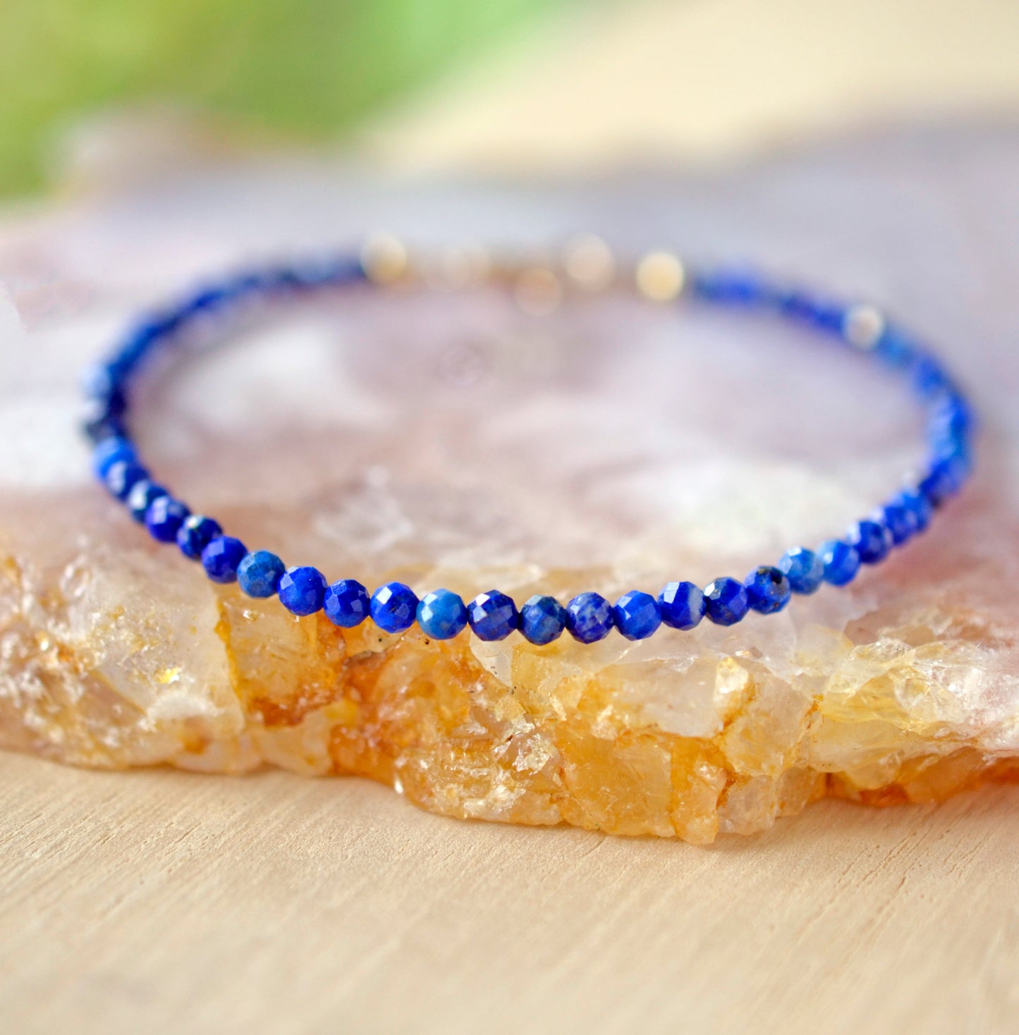 Minimalist Lapis Lazuli bracelet. Handmade with small 3mm natural lapis beads and set onto a sterling silver or 14k gold filled clasp.