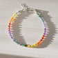Handmade real gemstone bracelet for the Chakras or Pride. Stones include: Garnet, amethyst, topaz, emerald, carnelian, CZ, and tanzanite.