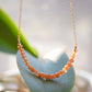 Sunstone Necklace with small faceted sunstone gems set onto a sterling silver or gold filled chain. 